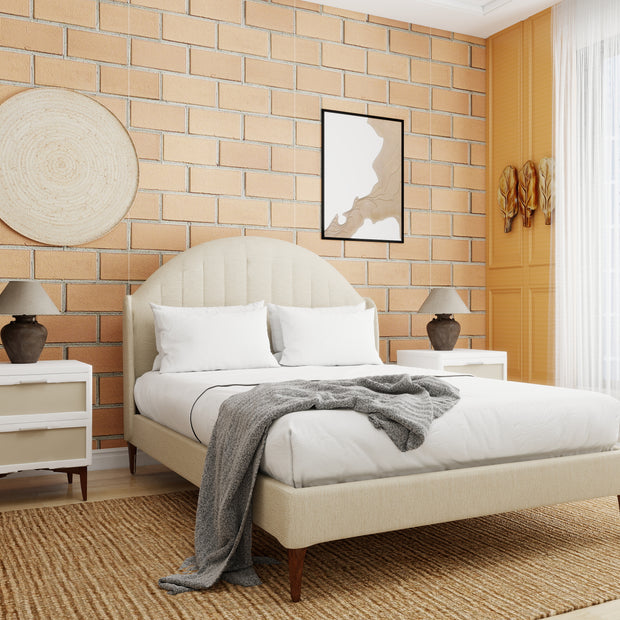 Havenwood off-white upholstered bed with arched headboard and wooden tapered legs in a modern bedroom.