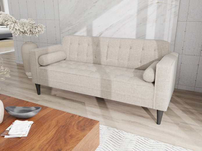 Arcadia grey 3-seater fabric sofa with tufted back and seat, bolster cushions, and dark tapered legs.
