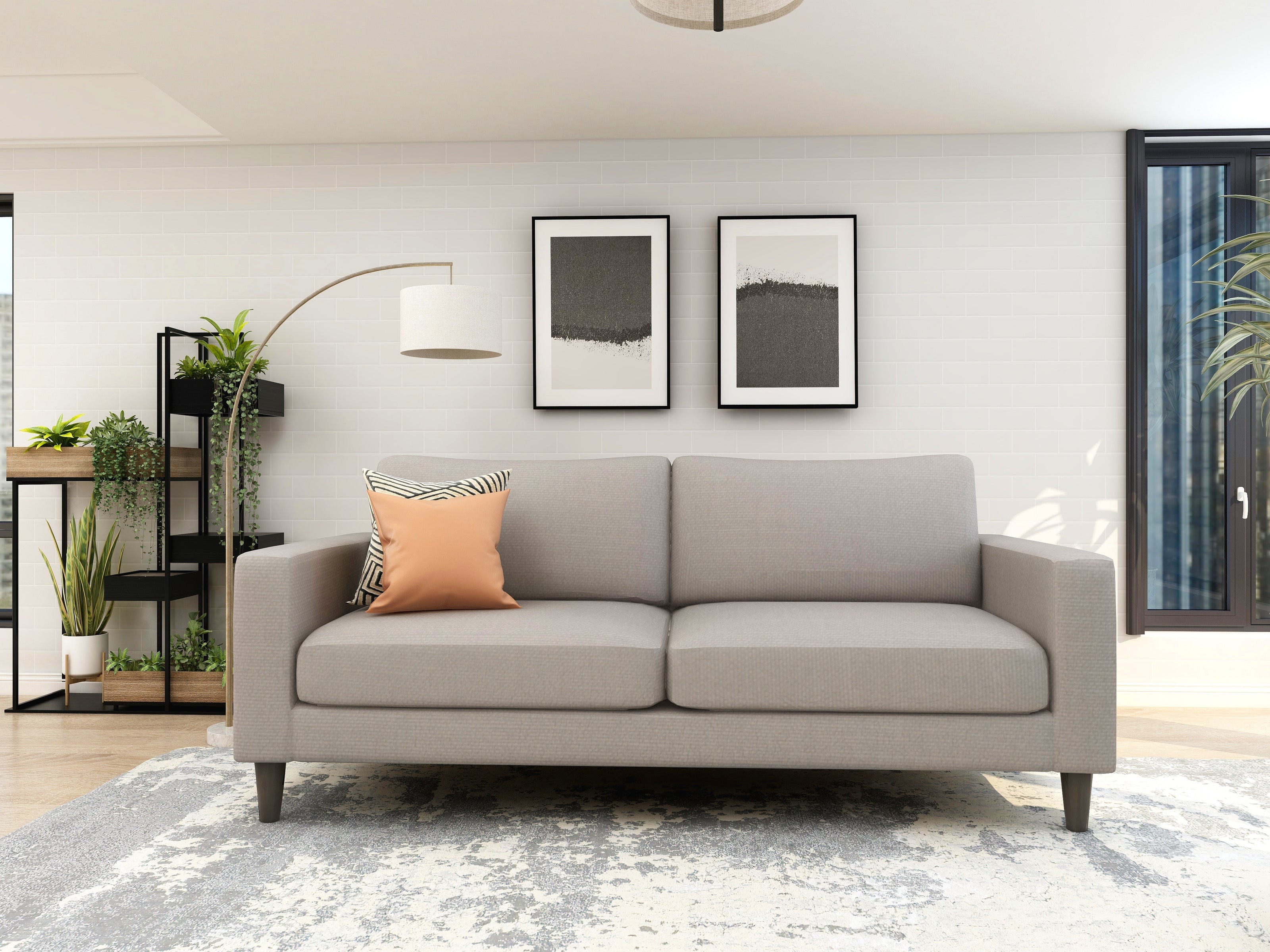 Grey 3-seater fabric sofa with tufted back and dark tapered wooden legs – The Grid.
