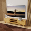 Amara AV Unit (Honey Ash) styled with TV in modern living room