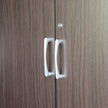 andle and soft-close hinge detail on wardrobe door