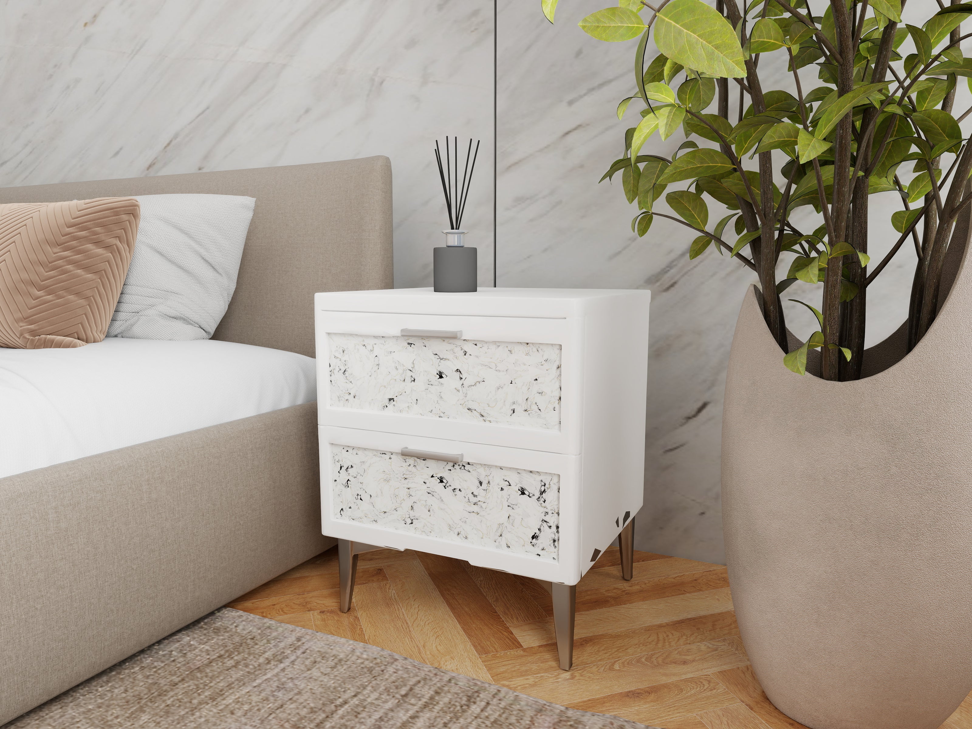 Slate nightstand styled next to an upholstered bed in a modern bedroom